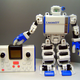 Illustration for article titled Japanese Toy Company Makes The Worlds Smallest 2-Legged Robot